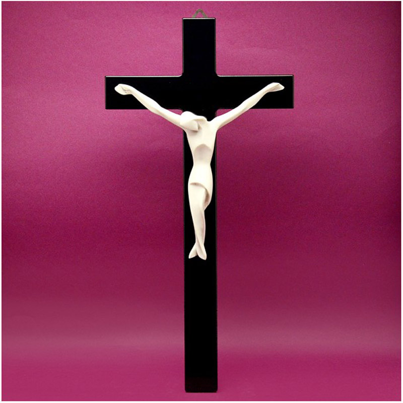 Crocifisso in legno laccato nero, e corpo del Cristo stilizzato moderno color avorio.